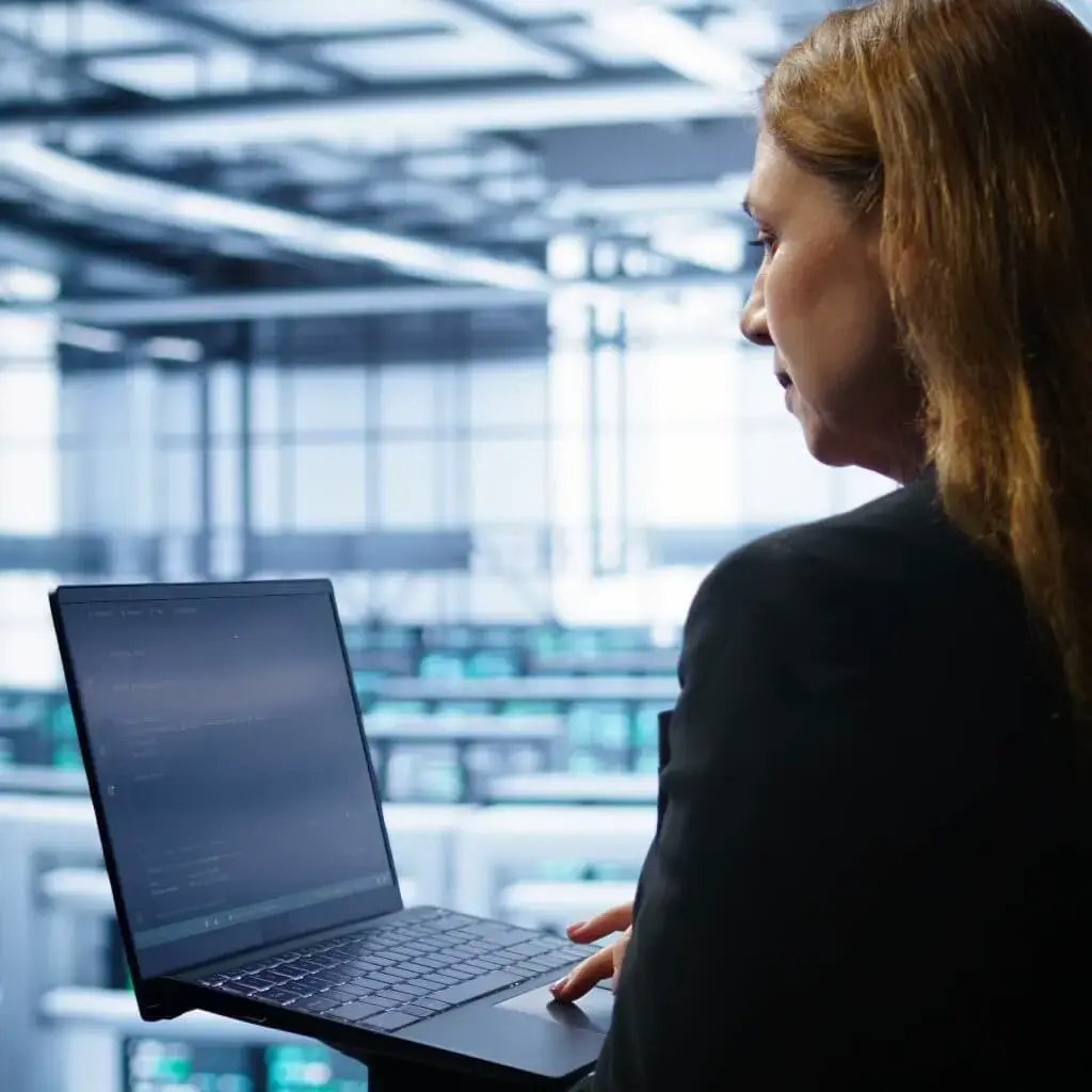 A woman working on a laptop